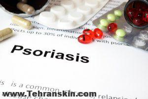 Paper with psoriasis and pills.